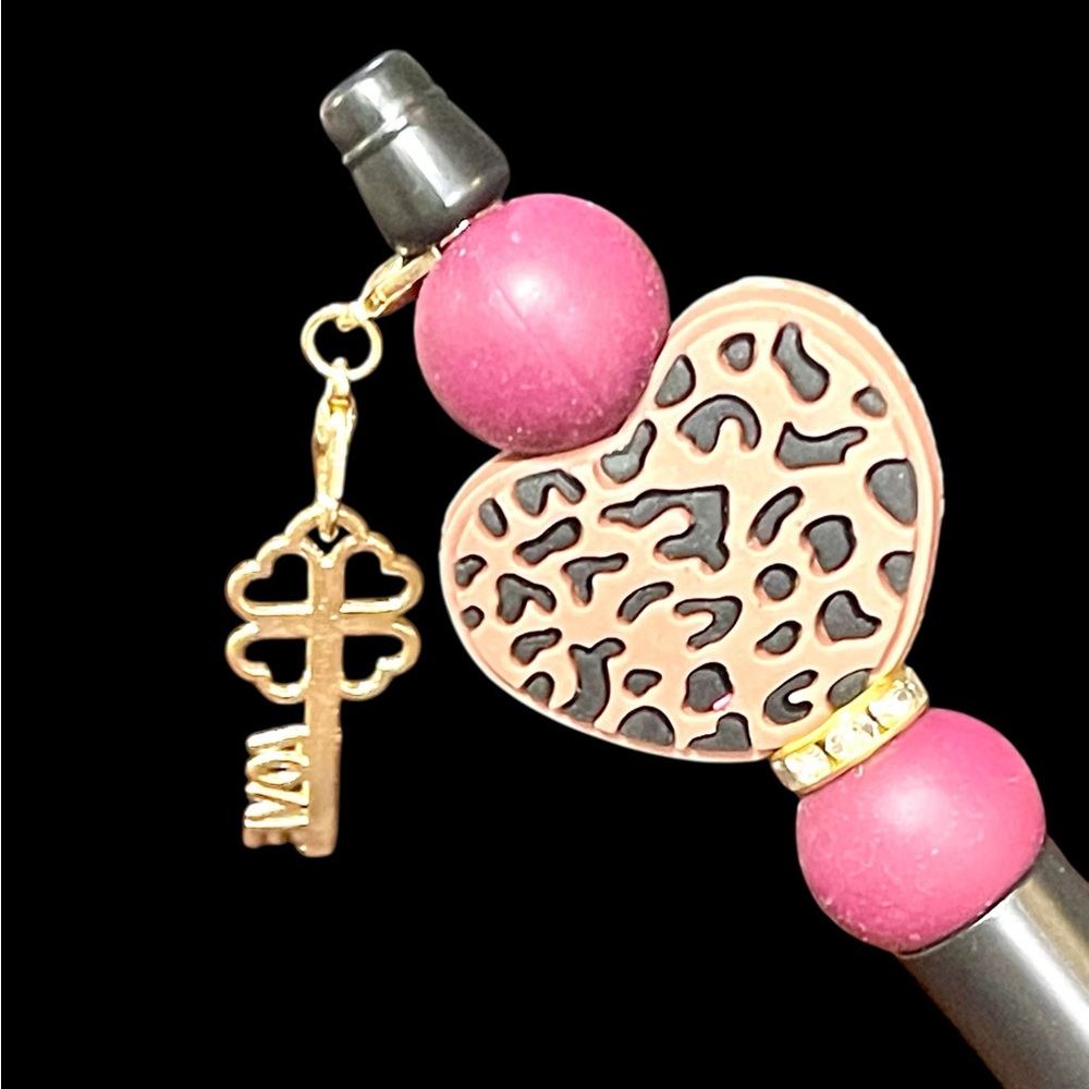 Handcrafted black leopard print heart pen with dangling gold Love key charm